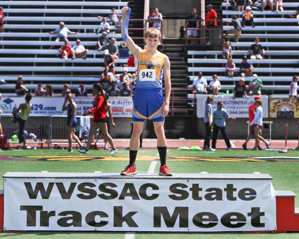 front page lead in pic Trevor Armes - WCSSAC 400 meter champion